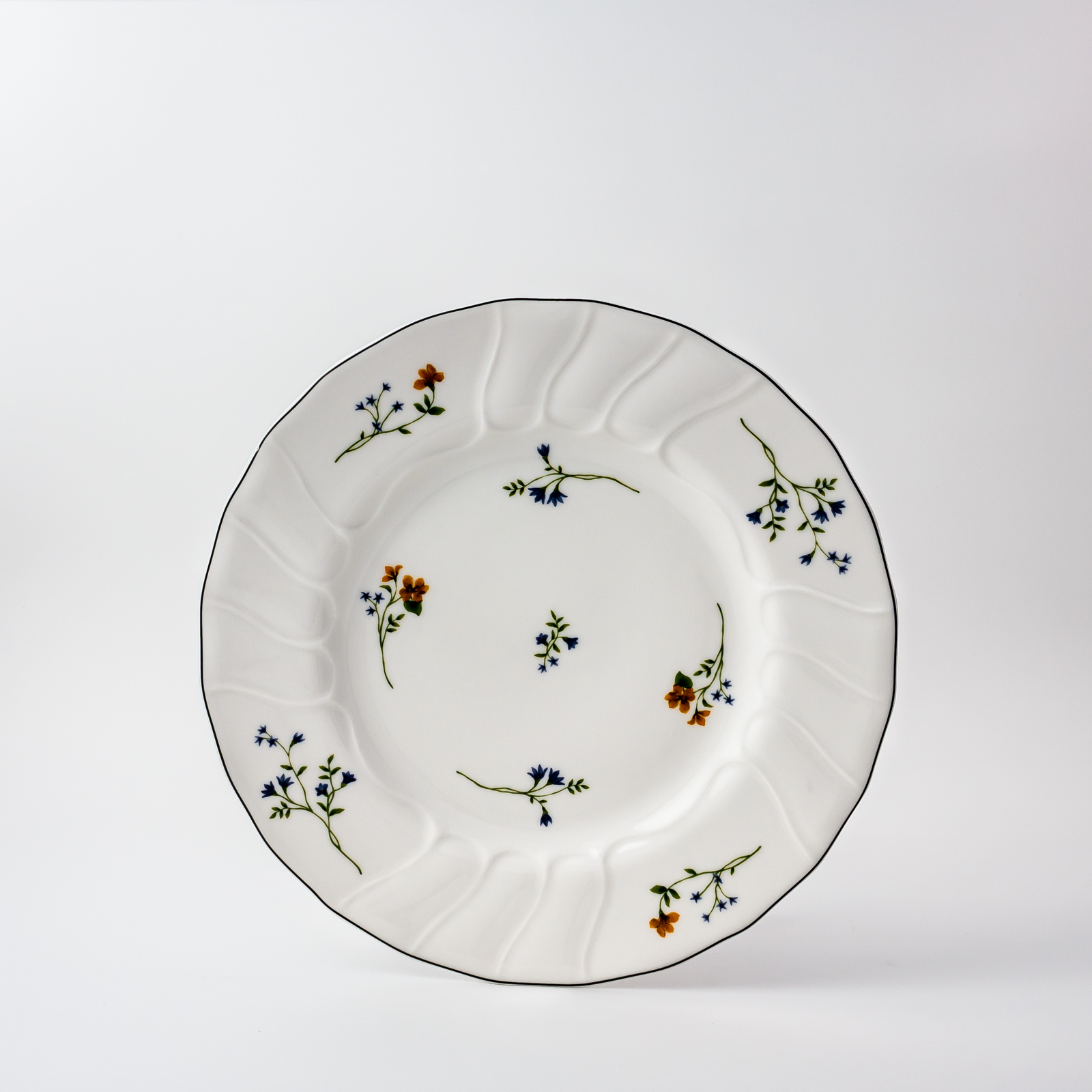 Round plate 26cm – Luxembourg – Wild flowers